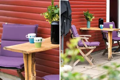 a table with purple chairs and two cups on it at LF11171-Struer-Klintevej-14 in Struer