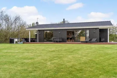 a house with a large yard in front of it at LF112-Vestervig-Ingeborgs-Alle-12 in Vestervig