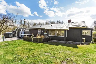 a house with a large yard in front of it at LF14223-Roslev-Livovej-9 in Roslev