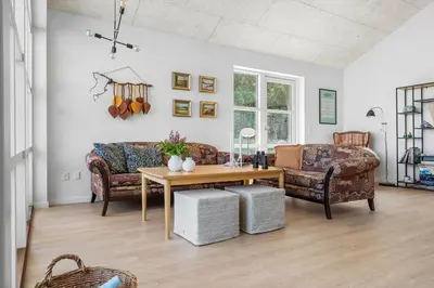 a living room with a couch and a table at LF13174-Nykobing-mors-Feggesundvej-70 in Nykøbing Mors