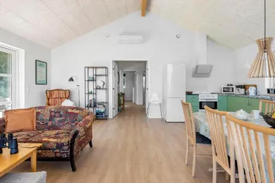 a living room with a couch and a table at LF13174-Nykobing-mors-Feggesundvej-70 in Nykøbing Mors
