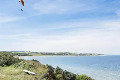 a person flying a kite over a body of water at LF11597-Struer-Plantagevej-97 in Struer