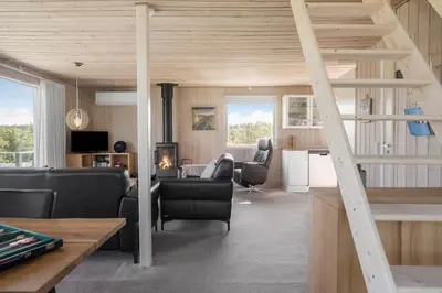 a living room with a staircase in a house at LF11111-Struer-Granvej-11 in Struer