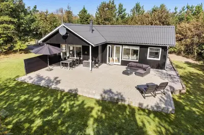 an overhead view of a house with a patio at LF601-Hurup-Thy-Blamejsevej-1 in Sønder Ydby