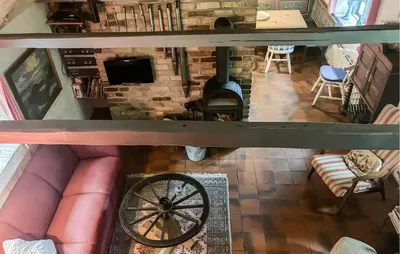 an overhead view of a living room with a brick fireplace at Gorgeous Home In Vemb With Wifi in Vemb