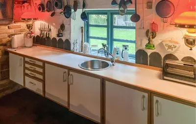 a kitchen counter with a sink and a window at Gorgeous Home In Vemb With Wifi in Vemb