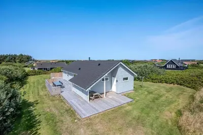 an aerial view of a house with a deck at 393-Harboore-Fourmivej-10 in Harboør