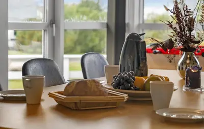 a table with a plate of food on it at Nice Home In Fjerritslev With Sauna in Fjerritslev
