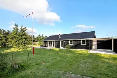 a house with a large yard in front of it at JB130-Fjerritslev-Thorup-Strandvej-274 in Fjerritslev
