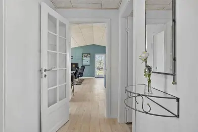 a hallway with a door and a glass table at JB130-Fjerritslev-Thorup-Strandvej-274 in Fjerritslev