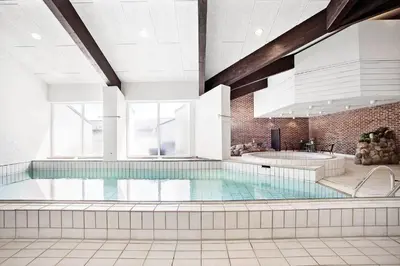 a large swimming pool in a building at JB181-Brovst-Strandvejen-150-Lejl-142 in Brovst