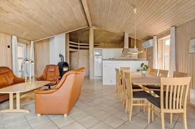 a kitchen and dining room with a table and chairs at JB290-Fjerritslev-Mollebosletten-41 in Fjerritslev