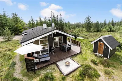an overhead view of a house with a deck at JB827-Fjerritslev-Revlingestien-93 in Fjerritslev