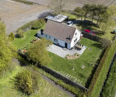 an aerial view of a house with a yard at JB151-Brovst-Tranum-Engevej-137 in Brovst