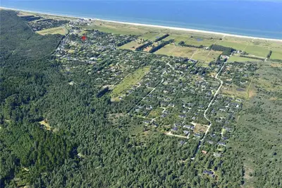 an aerial view of a town on the shore of the ocean at JB988-Fjerritslev-Skovstien-6 in Fjerritslev