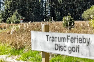 a sign that reads tramterm fertility disc golf at JB299-Brovst-Kronvildtvej-224 in Brovst
