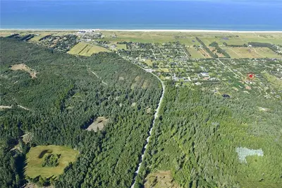 an aerial view of a town on a hill with trees at JB538-Fjerritslev-Tyttebaerstien-33 in Fjerritslev