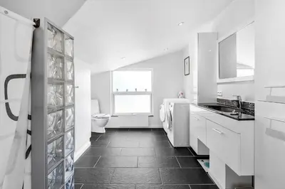 a white kitchen with a sink and a toilet at JB118-Fjerritslev-Ahornvej-8 in Fjerritslev