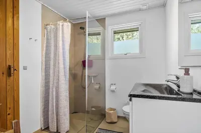 a bathroom with a shower and a sink at JB128-Fjerritslev-Pilevej-2 in Fjerritslev