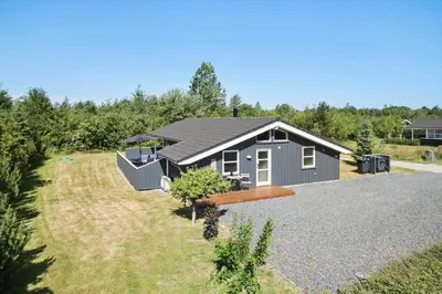 a small house in the middle of a yard at JB792-Fjerritslev-Egevej-34 in Fjerritslev