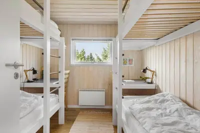 a bedroom with two bunk beds and a sink at JB242-Fjerritslev-Poppelvej-8 in Fjerritslev