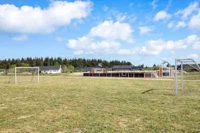 an empty field with two soccer goals on it at JB214-Brovst-Kronvildtvej-214 in Brovst