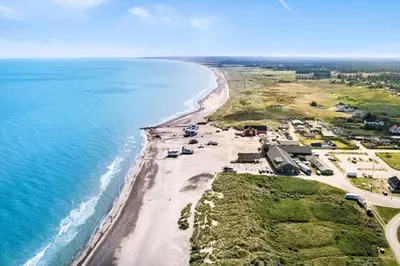 an aerial view of a beach and the ocean at JB219-Fjerritslev-Tyttebaerstien-4 in Fjerritslev