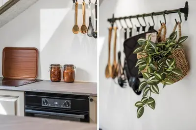 a kitchen with a plant on a wall next to a stove at JB273-Fjerritslev-Hasselvej-39 in Fjerritslev
