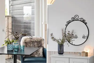 a living room with a table and a mirror at JB234-Frostrup-Strandvejen-83-A in Frøstrup