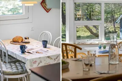 a dining room with a table and a window at JB246-Brovst-Graevlingevej-13 in Brovst