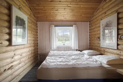 a bedroom with two beds and a window at JB125-Fjerritslev-Lyngbjergvej-31 in Fjerritslev
