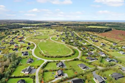 an aerial view of a park with houses and cars at JB187-Brovst-Kronvildtvej-128 in Brovst