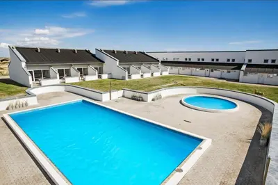 an image of a house with a swimming pool at JB129-Brovst-Strandvejen-150-Lejl-106 in Brovst