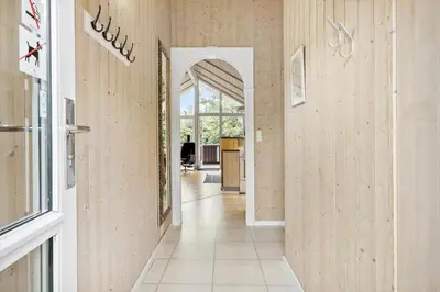 a hallway with an archway in a house at JB223-Brovst-Kronvildtvej-18 in Brovst