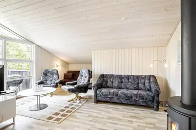a living room with a couch and two chairs at JB243-Fjerritslev-Aspevej-1 in Fjerritslev