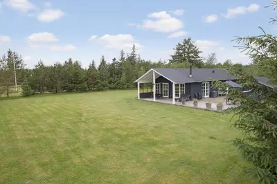 a home with a large yard with a house at JB283-Frostrup-Andreas-Lassens-Vej-6 in Frøstrup