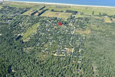 an aerial view of a city with houses and trees at JB255-Fjerritslev-Blabaerstien-22 in Fjerritslev