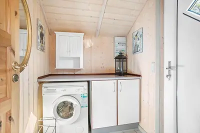 a washer and dryer in a tiny house at JB198-Fjerritslev-Tyttebaerstien-40 in Fjerritslev
