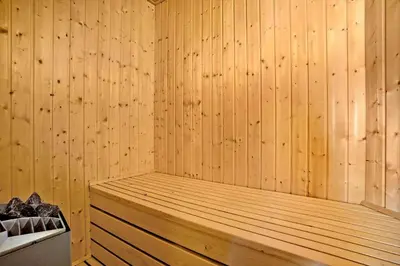 a wooden sauna with a wooden tub in it at JB198-Fjerritslev-Tyttebaerstien-40 in Fjerritslev