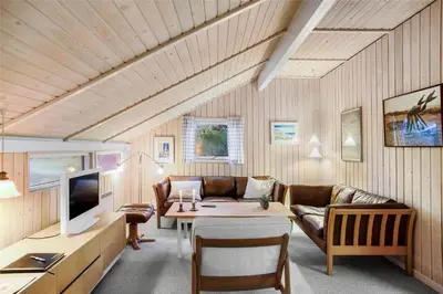 a living room with a couch and a table at JB138-Fjerritslev-C-J-Thaningsvej-3 in Fjerritslev