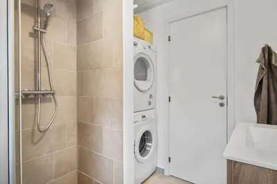 a laundry room with a washer and dryer at JB195-Fjerritslev-Bogevej-36 in Fjerritslev