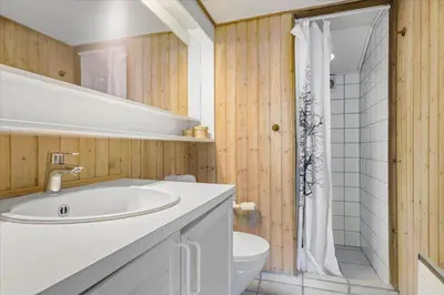 a bathroom with a white sink and a toilet at JB149-Fjerritslev-Tulipanvej-23 in Fjerritslev