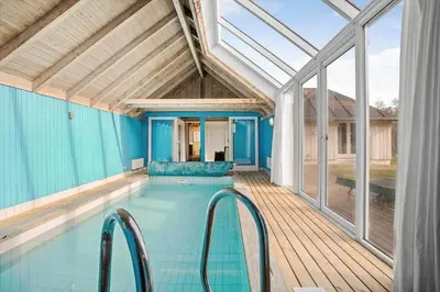 an indoor swimming pool with a glass roof at JB149-Fjerritslev-Tulipanvej-23 in Fjerritslev