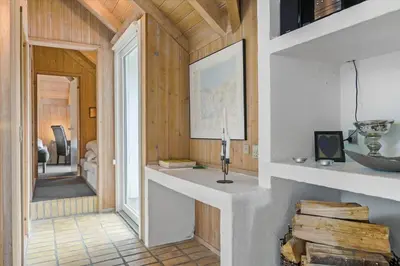 a living room with a counter and a mirror at JB149-Fjerritslev-Tulipanvej-23 in Fjerritslev