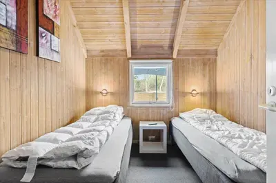 a room with three beds and a window at JB149-Fjerritslev-Tulipanvej-23 in Fjerritslev