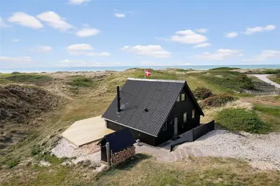 an aerial view of a small house on a hill at 850-Thisted-Sandvej-19 in Thisted