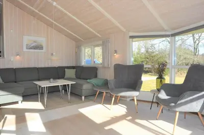 a living room with a couch and chairs and a table at 80153-Vemb-Knudehus-49 in Vemb