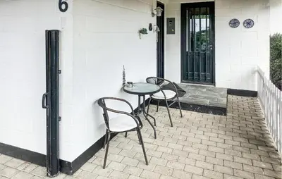 a table and chairs sitting on a patio at Pet Friendly Home In Struer With Wifi in Struer