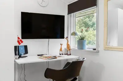 a room with a desk with a computer and a window at JB162-Fjerritslev-Ronnevej-4 in Fjerritslev