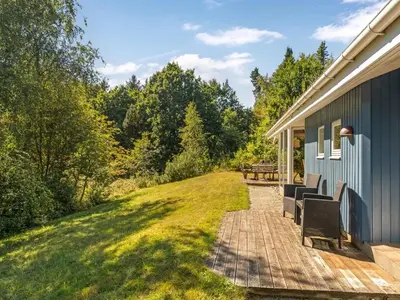 a patio with two chairs on a house at Holiday Home Elizabeth - 150m to the fjord by Interhome in Fur